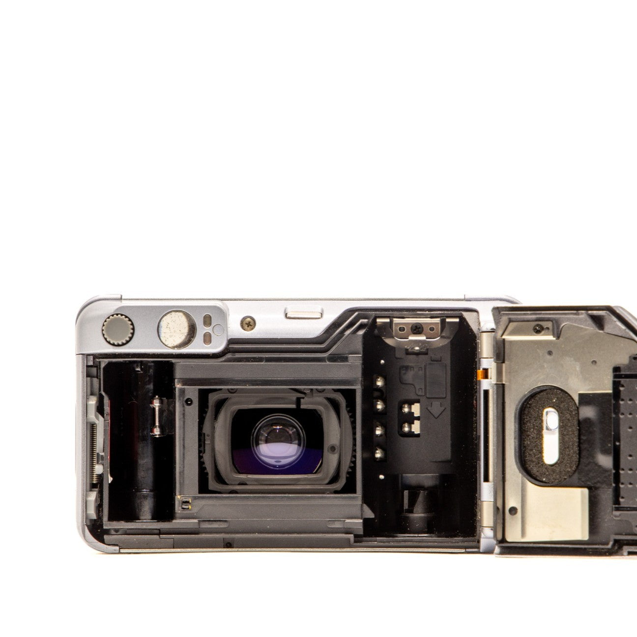 Internal view of the Canon Autoboy N130 lens mechanism and mechanics – 35mm film camera close-up
