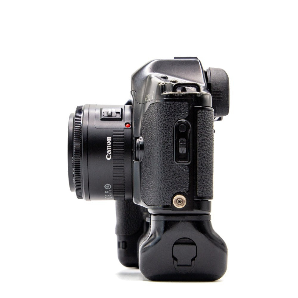 Back view of the Canon EOS-1 vintage 35mm SLR camera showing film door and controls
