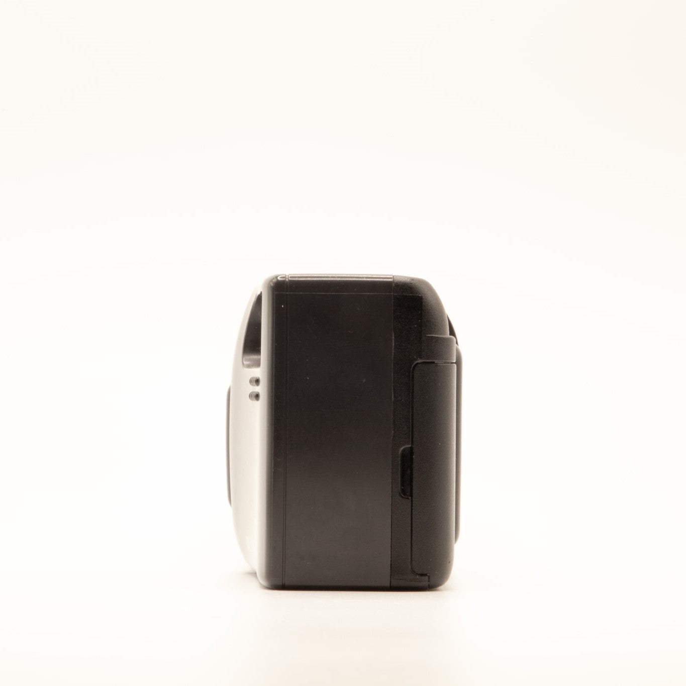 Side view of the Olympus AF-1 Super vintage 35mm film camera body