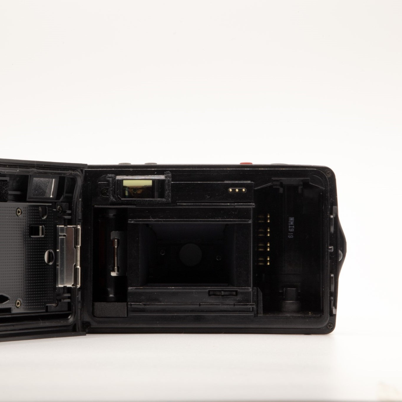Internal view of the Olympus AF-1 Twin lens mechanism and mechanics – 35mm film camera close-up