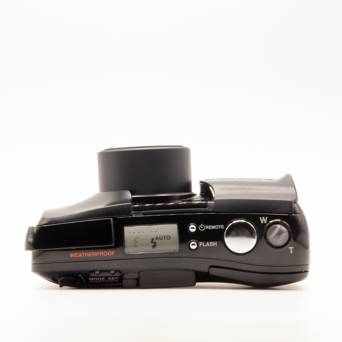 Top plate of the Olympus MJU Zoom 105 35mm film camera showing shutter button and dials