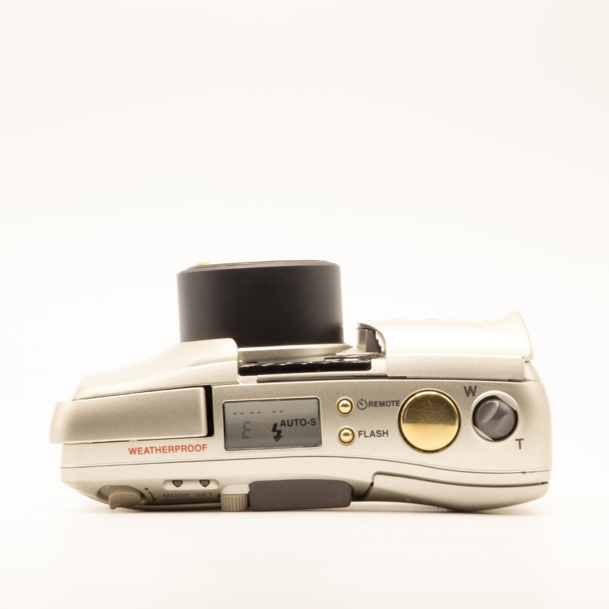 Top plate of the Olympus MJU Zoom 105 Deluxe 35mm film camera showing shutter button and dials