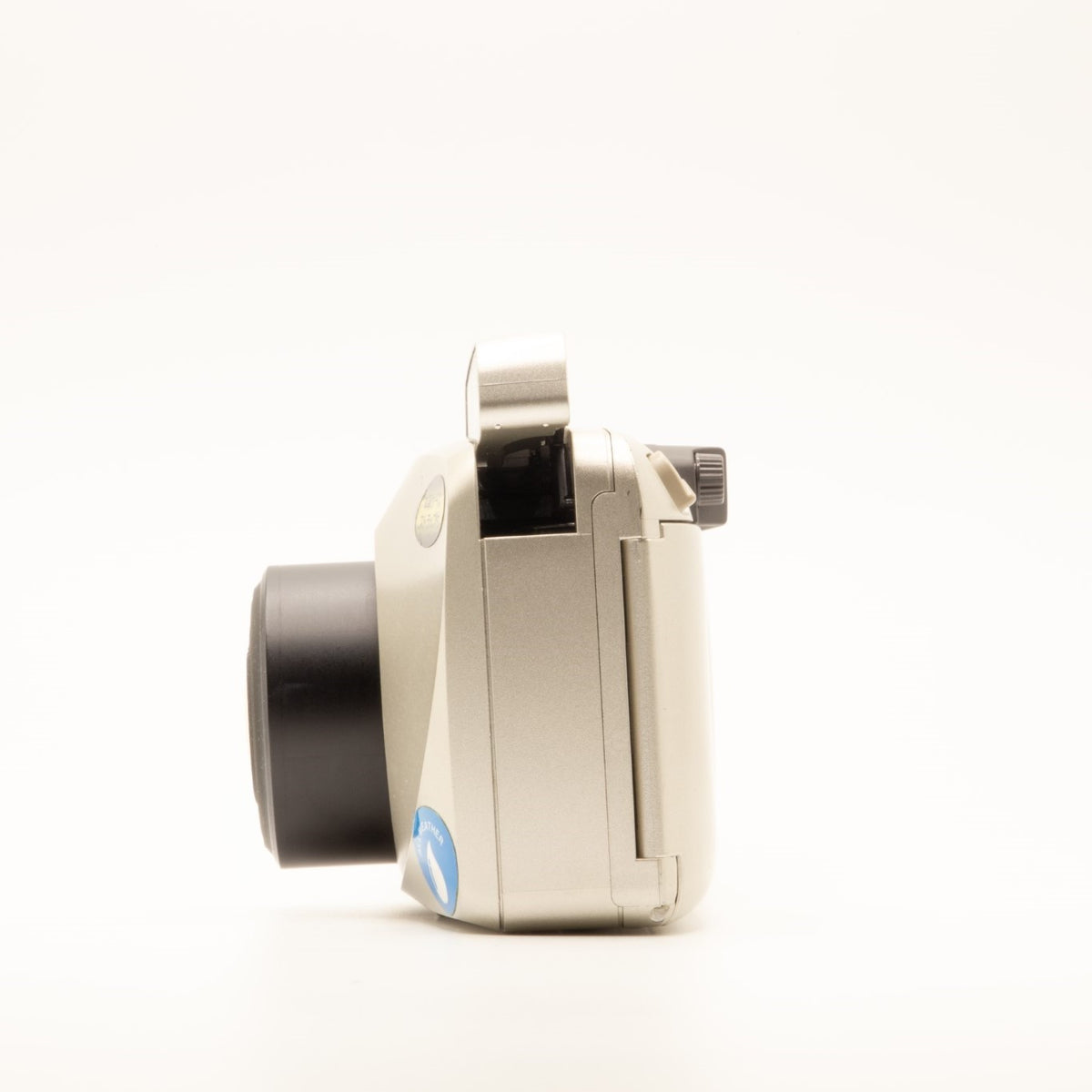 Side view of the Olympus MJU Zoom 140 Deluxe vintage 35mm film camera body