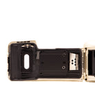 Olympus MJU Wide 80 film chamber door internals, showing the 35mm film loading mechanism