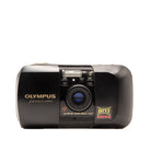 Olympus film camera on a white background