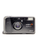 A black Yashica T4 compact film camera with a Carl Zeiss Tessar 3.5/35mm lens shown against a plain white background.